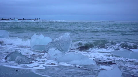 120 fps slow motion of waves from Diamond beach in Iceland. Popular holiday spot Stock Footage 134499177