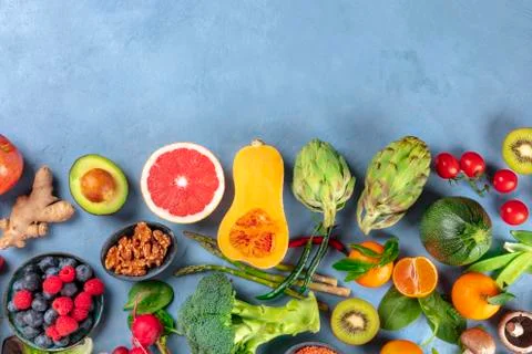 Vegan  food.  Healthy  diet  concept.  Fruits,  vegetables,  nuts,  mushrooms,  shot  from  the  top.  A  flat  lay  composition  with  a  place  for  text xkwx vegan,  vegetarian,  food,  healthy,  diet,  background,  fruit,  vegetable,  above,  view,  top,  shot,  flat,  lay,  flat  lay,  flatlay,  nuts,  table,  cooking,  kitchen,  fresh,  nutrition,  veg,  produce,  supermarket,  organic,  vitamin,  carbohydrate,  fiber,  wholesome,  superfood,  grapefruit,  artichoke,  broccoli,  various,  variety,  assortment,  many,  different,  copy,  space,  copyspace,  copy  space,  place,  text,  overhead,  avocado,  ginger,  farmers,  market