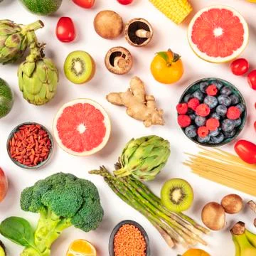 Vegan  food.  Healthy  diet  concept.  Fruits,  vegetables,  pasta,  nuts,  legumes,  mushrooms,  overhead  square  shot  on  a  white  background.  A  flatlay  composition xkwx vegan,  vegetarian,  food,  healthy,  diet,  white,  background,  fruit,  vegetable,  pasta,  mushrooms,  legumes,  pulses,  overhead,  above,  view,  top,  shot,  flat,  lay,  flat  lay,  flatlay,  table,  cooking,  kitchen,  raw,  fresh,  nutrition,  ingredient,  concept,  veg,  produce,  supermarket,  organic,  vitamin,  carbohydrate,  fiber,  wholesome,  natural,  superfood,  grapefruit,  artichoke,  broccoli,  various,  variety,  assortment,  many,  different,  pattern,  ginger