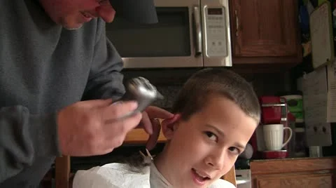 120511 Boy getting home haircut 5 Stock Footage 11014053