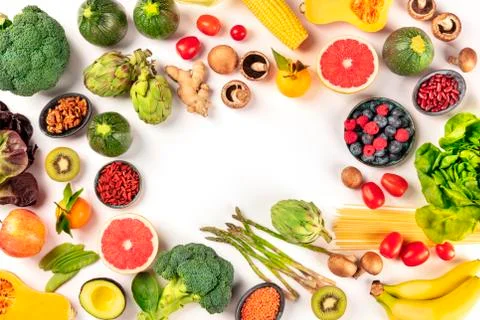 Vegan  food.  Healthy  diet  concept.  Fruits,  vegetables,  pasta,  nuts,  legumes,  mushrooms,  shot  from  the  top  on  a  white  background,  forming  a  frame  with  a  place  for  text.  A  flat  lay  composition xkwx vegan,  vegetarian,  food,  healthy,  diet,  white,  background,  fruit,  vegetable,  pasta,  mushrooms,  legumes,  pulses,  overhead,  above,  view,  top,  shot,  flat,  lay,  flat  lay,  flatlay,  nuts,  table,  kitchen,  raw,  fresh,  nutrition,  ingredient,  veg,  produce,  organic,  vitamin,  fiber,  wholesome,  grapefruit,  artichoke,  broccoli,  variety,  many,  frame,  copy,  space,  copyspace,  copy  space,  place,  text,  ginger,  design,  template