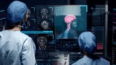 Professional doctors analyzing patient's medical MRI diagnosis.