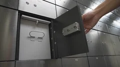 Hand close Metal safe box panel wall. Concept for security and banking protec