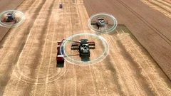 Autonomous transportation in agriculture. Self-driving harvesters ride on wheat