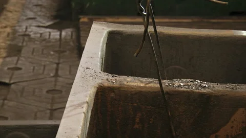 125. Cast cast-iron two-chamber billet of rectangular shape. Stock Footage 93283126