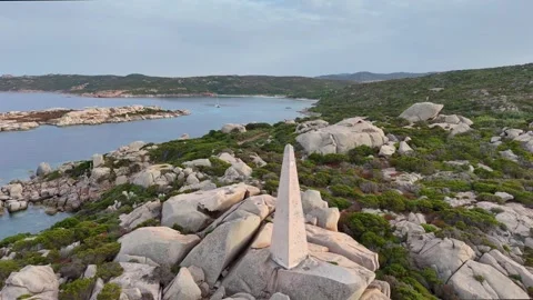 126-Sideways Drone Shot Close to Lighthouse and Rocks Sardegna Mediterranean Vídeo Stock 333577539