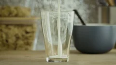 Glass of milk in slow motion.