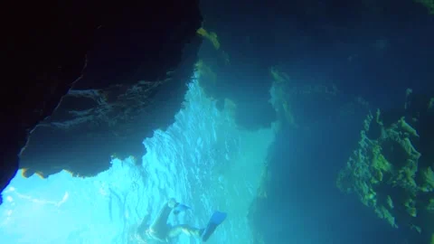 12969-2slow motion of bottom to top view of Jesus light shinning through blue oc Stock Footage 328648325