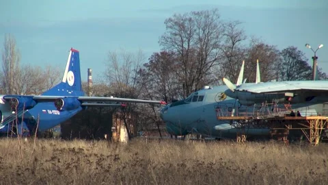 An-12BK (NATO - Cube) of Irkut Airlines. Number RA-11310. Aircraft towing. Stock Footage 194496841