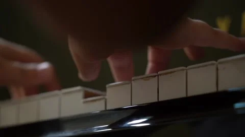 1/3 Closeup of Boy hands playing old vintage piano keyboard Stock Footage 203841252