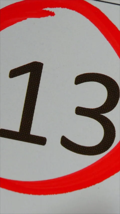 13 - Marking The Date In The Calendar With A Red Marker. The Thirteenth Day Of T Stock Footage 284344954