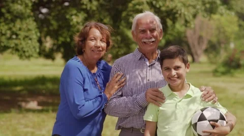 13-Portrait Happy Family Grandparents And Boy With Soccer Ball Stock Footage