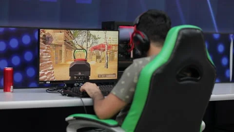 1/3 Young man plays computer battle games Stock Footage 216775194