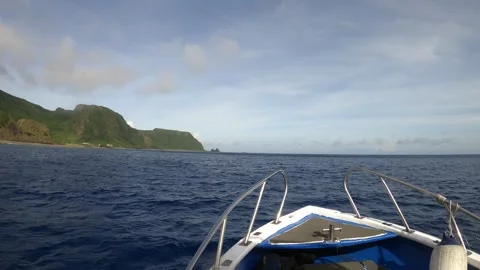 13024Slow motion still camera view look out to Ocean Horizon with mountains in f Stock Footage 329641702