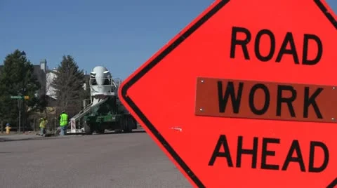 130315f road work sign with work in background Видео 22100417