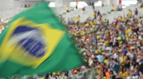 1306024 - Maracana Stadium, Rio de Janeiro, telephoto crowd with brazilian flag Stock Footage