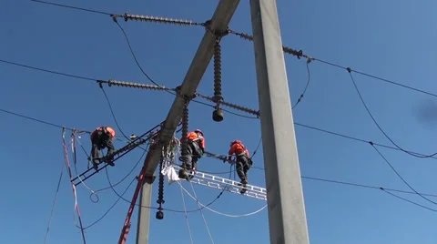 1314 Workers in high voltage pylons Stock Footage 36791920