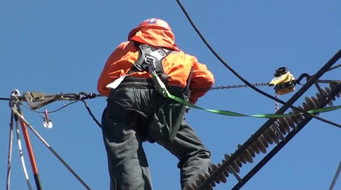 1315  Workers in high voltage pylons Stock Footage 36792506