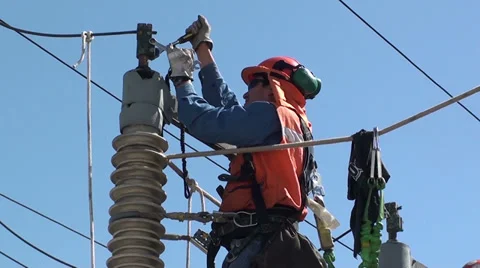 1317 Workers in high voltage pylons Stock Footage 37013227