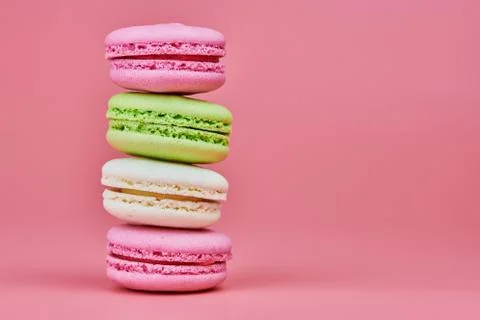 Macaroons  on  pink  background.  Colorful  small  cookie  from  ground  almonds  and  coconut.  Popular  confectionery.  Tasty  snack  food  for  take  away,  copy  space xkwx macaroons,  macaroon,  macaron,  pink,  colorful,  confectionery,  cookie,  popular,  copy  space,  cake,  pastry,  cupcake,  shortcake,  tasty,  food,  design,  snack,  take,  away,  ground,  almonds,  coconut,  small,  red,  studio,  bunch,  green,  beige,  dessert,  pastel,  different,  assorted,  cuisine,  cafe,  vintage,  bakery,  candy,  sweet,  french,  sandwich,  color,  desert,  sweetness,  honey,  goody,  flavor,  gourmet,  breakfast,  delicious,  column