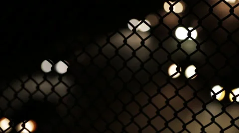 134 Highway - Headlights - Night - Chain Link Fence Stock Footage 46448649