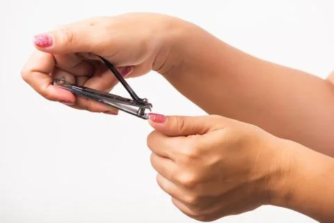 Close up young Asian woman have tool cutting nails fingernails on finger using a nail clipper. Female using tweezers by herself, studio shot isolated on white background, Healthcare concept xkwx nail, clipper, clip, cut, fingernail, human, hand, shorten, woman, trim, finger, tool, toenails, healthcare, adult, hands, fingers, people, girl, healthy, accessory, female, isolated, cutout, clean, instrument, clippers, health, young, thai, asian, care, beauty, manicure, closeup, hygiene, scissors, person, stainless, steel, body, cosmetics, skin, object, trimmer, metal, trimming, beautiful, equipment, white