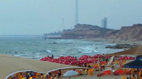 138 RED PARASOLS AT THE BEACH Stock Footage 10807807
