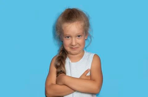 Mischievous little gir with curly hairl making sarcastic face, like seriously, perfect use for memes. A portrait of an caucasian beautiful girl. xkwx adorable, hair, happiness, happy, indian, isolated, joy, kid, little, model, people, person, portrait, pretty, small, smile, young, girl, gesture, innocent, attractive, beautiful, funny, cheerful, child, childhood, carefree, expression, emotion, face, cute, youth, curious, excited, sarcastic, imitation, caucasian, surprise, looking, female, studio, healthy, lovely, human, head, children, preschool, confidence, advertising, surprised