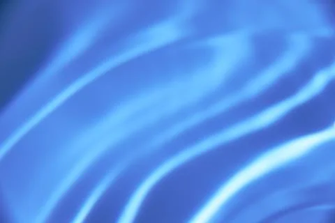 141.An abstract background of undefined shapes with various shades and wave.. Stock Photos