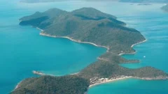 Whitsunday Islands, Australia. Beautiful ocean colors, aerial view. Slow motion
