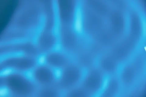 142.An abstract background of undefined shapes with various shades and wave.. Stock Photos