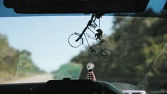knick knack hanging on car rearview mirror 60fps