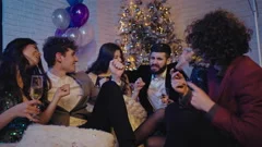 Group of attractive students very excited at Christmas party celebrating
