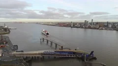 Stena Line logistics ship departing terminal aerial descend view