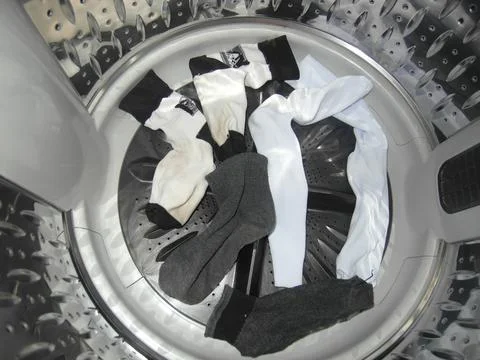 ถุงเท้าในเครื่องซักผ้า Stock Photos