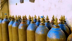 Stock of empty blue oxygen cylinders for industry. Liquified oxygen