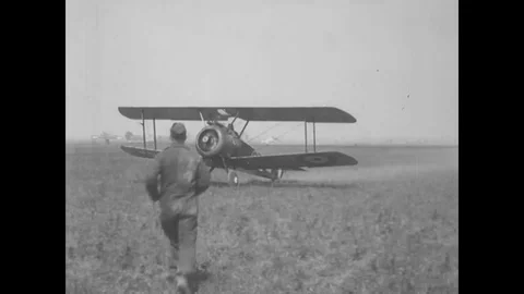 148th Aero Squadron pilot crashes his plane while landing, pilots pose with a Stock Footage 124084399