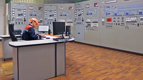 15 0489 ch1 EngineerLooksAtMonitor Stock Footage 105460446