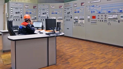 15 0491 ch2 EngineerTalksPhoneMakingNotes Stock Footage 105460638