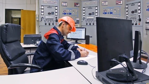 15 0492 ch1 EngineerSitsWritesLog Video stock 105460697