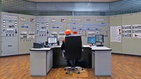 15 0495 ch1 EngineerLooksAtMonitor Stock Footage 105460795