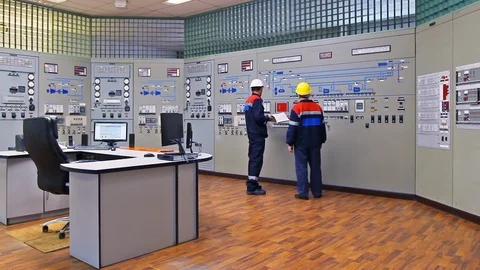 15 0513 TwoEngineersShowingCircuit Stock Footage 105461980