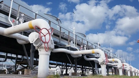 15 0519 2 Clouds WorkerClosesValve Video stock 105463962