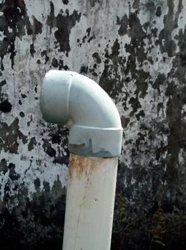 15 year old drain pipe portrait Stockfoto's