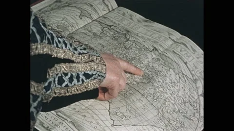 1500s: Hand pointing to map. Man with clapboard. Interior of house with medieval Stock Footage 165606592