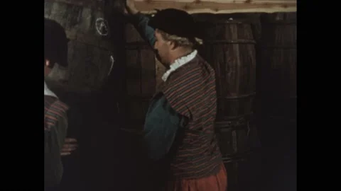 1500s: Large stack of barrels, men stacking more on top. Stock Footage 228784089