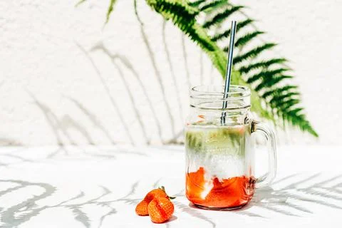 mug with a cold drink of strawberries, matcha and milk and ingredients xkwx strawberry matcha latte, beverage, cocktail, cold, cool, drink, fresh, fruit, glass, green, herb, ice, ingredient, juice, leaf, lemonade, lime, mint, refreshing, tropical, sweet, soda, sun, sunlight, tonic, closeup, detox, diet, food, freshness, healthy, homemade, iced, liquid, natural, organic, refreshment, shake, table, summertime, party, strawberry, matcha, milkshake, milk, smoothie, straw