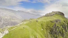 Stunning aerial reveal of Snowdonia Nation Park over Mount Snowden as