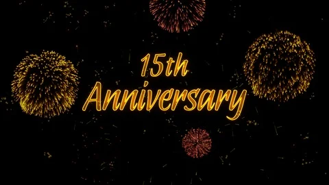 15th Anniversary Greeting text with particles, colored fireworks, sparks Stock-Footage 99057464