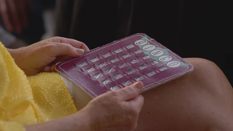 16 Bingo card on lap Stock Footage 97641538